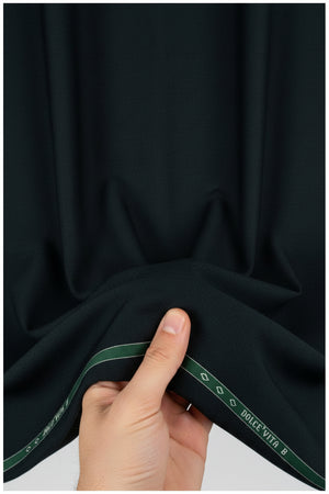 Raymond Luxurious Unstitched Poly Wool Trousers Fabric in Green Spinach color, showing the textured fabric close-up.