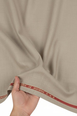 Beige Raymond unstitched poly wool trouser fabric with a smooth textile texture, ideal for tailoring and custom trousers.
