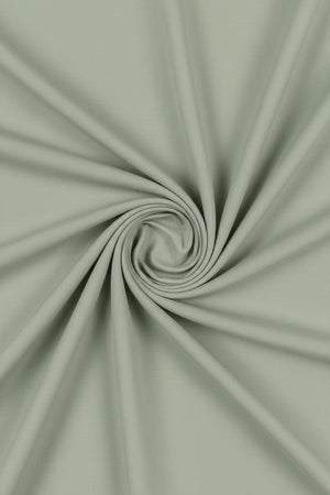 Olive green Tessuti satin unstitched shirting fabric from Mensfabric, shown in a close-up of the smooth, shiny textile.