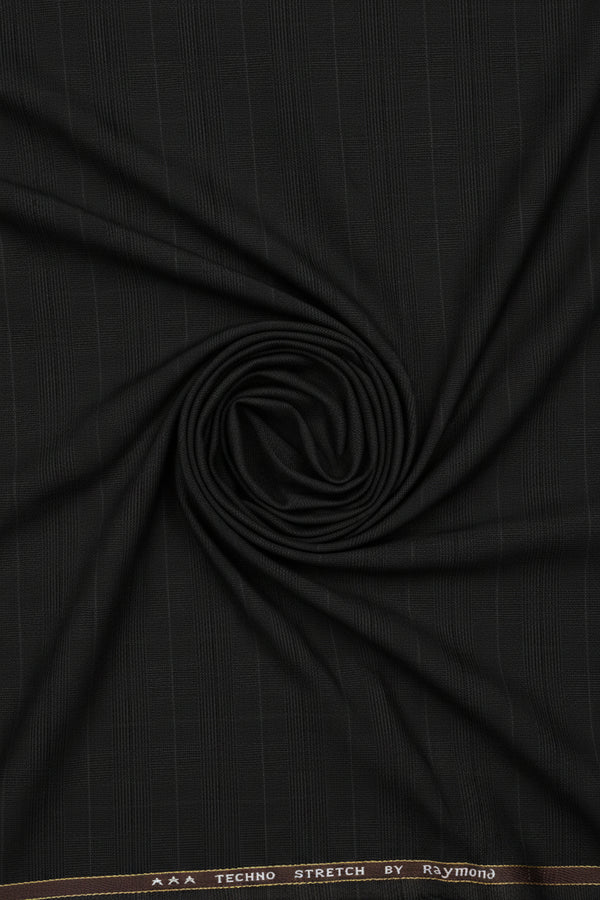 Raymond Polyviscose trousers and suiting fabric in coffee brown, showing a close-up of the textured fabric and color details.