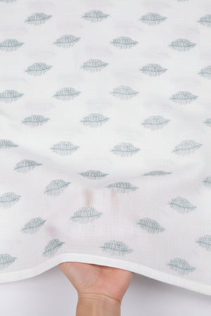 Textured white paper with blue leaf pattern