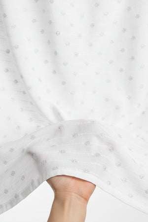 White fabric with small floral patterns
