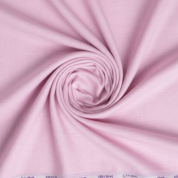 Pink Irish linen fabric by ARVIND featuring a soft, textured linen surface suitable for shirt making.