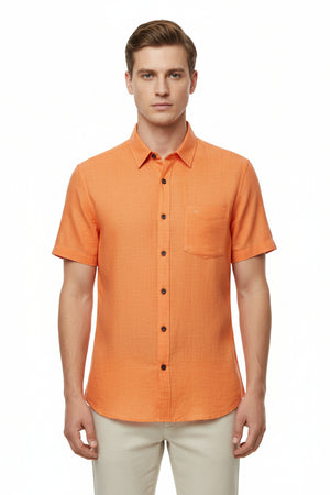 Orange Arvind Tresca cotton unstitched shirting fabric with detailed weave pattern, suitable for making custom shirts.