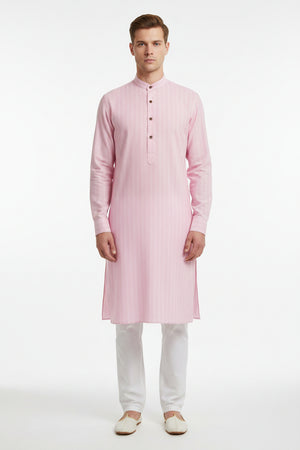 Pink Arvind cotton shirting fabric, close-up of smooth woven textile with subtle sheen, ideal for shirts and dressmaking