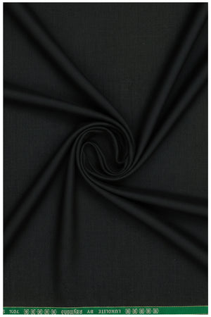 Raymond Luxurious unstitched polywool trousers and suiting fabric in green spinach color, showing fabric texture and color detail.