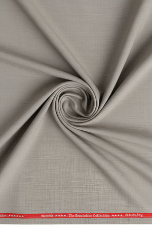 Beige Raymond unstitched poly wool fabric for trousers and suits, shown in a close-up of the textured textile.