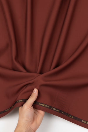 Rust red Roberto Cavali 140's poly wool trouser and suiting fabric, high-quality men's fabric for tailored suits and trousers.