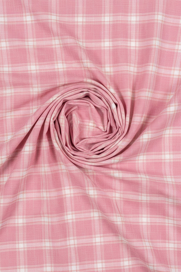 Pink Arvind Tresca cotton shirt fabric with classic check pattern, showcasing soft cotton texture and vibrant color details.
