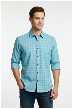 Clear blue Tresca cotton checks shirting fabric by Arvind, showcasing a soft, unstitched textile with a classic check pattern.