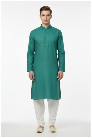 Teal green cotton shirt fabric by Arvind, textured textile with subtle patterns suitable for shirts or apparel.