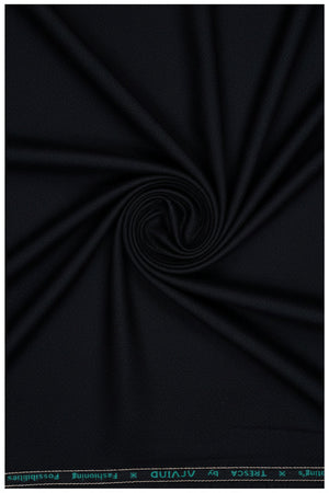 Black Raymond Arvind poly viscose trousers and suiting fabric, showing the fabric texture and garment detail.
