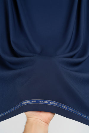 Royal blue Raymond unstitched polywool trousers and suiting fabric shown in close-up with textured fabric details.