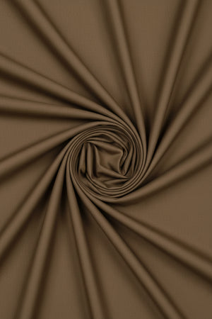 Brown Arvind Cotton Lycra stretchable trouser and suiting fabric, showing textured cotton and lycra blend material.