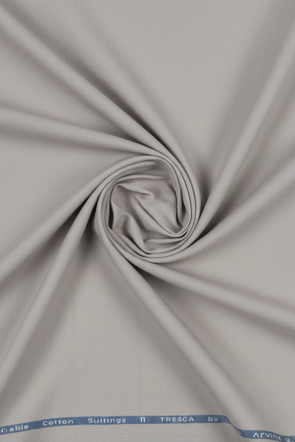 Steel grey Arvind cotton lycra stretchable suiting fabric shown in close-up with smooth texture and slight sheen.