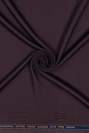 Raymond luxurious unstitched polywool trousers and suiting fabric in grape purple, showing the textured textile fabric.