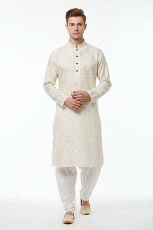 Golden Arvind Tresca cotton jacquard shirting fabric, unstitched textile with intricate woven patterns and rich texture.