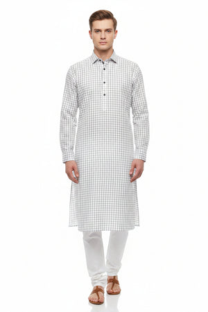 Pink and black checkered Arvind Tresca cotton shirt fabric with a white background, showcasing a premium woven design.