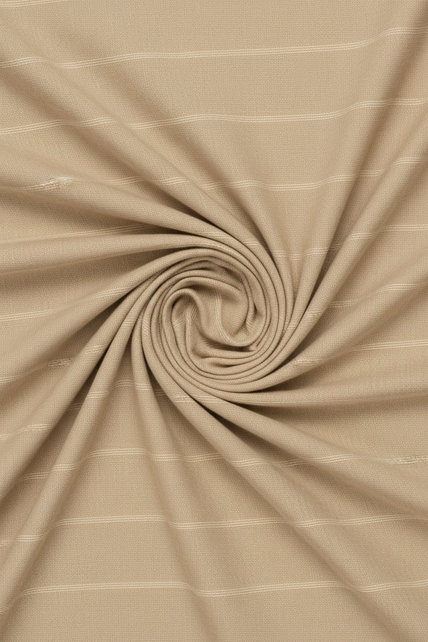 Beige tan striped Arvind Tresca cotton shirt fabric close-up showing smooth texture and premium quality material.