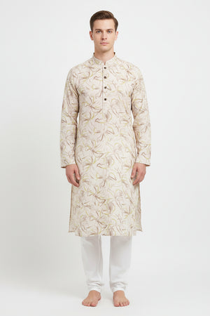 Arvind Tresca Giza cotton shirt fabric with digital print in peach and multicolor, showcasing a vibrant textile pattern.