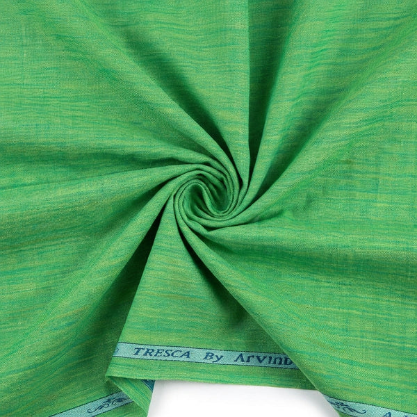 Green Arvind Tresca Giza Cotton shirting fabric with a swirl pattern, ideal for stylish shirts and dress materials.