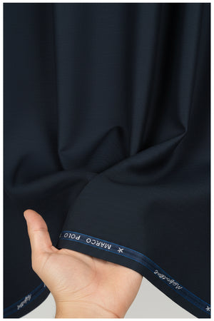 Mafatlal unstitched poly wool trouser and suiting fabric in dark slate blue, showing the fabric's texture and color detail.