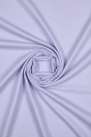 Mafatlal Cotton Unstitched Pinstripes Shirting Fabric in Pervenche Blue, showcasing the fabric's blue pinstripe pattern and cotton texture.