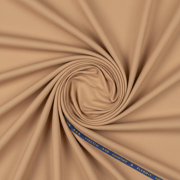 Arvind Cotton Lycra trousers and suiting fabric in tan color, showcasing the textured fabric and tailored fit.