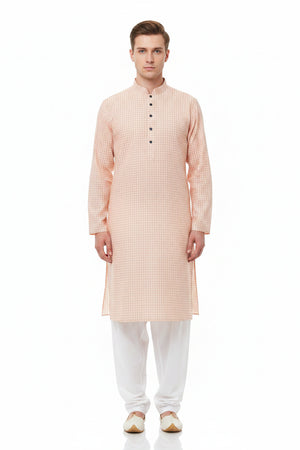 Peach Arvind cotton checks shirting fabric with a classic plaid pattern, ideal for stylish men's or women's shirts.