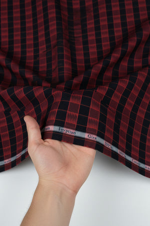 Red and black checkered fabric with 'Cotton' label on top