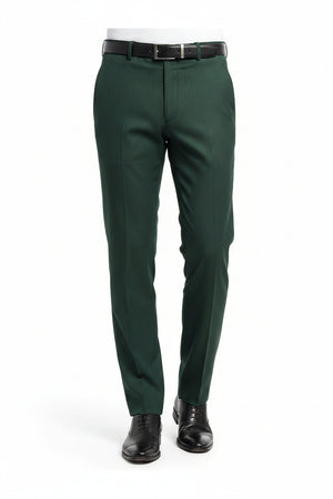 Green Raymond Polyviscose trousers and suiting fabric fabric with a smooth, woven texture suitable for formal wear.