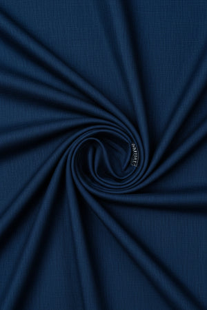 Blue Raymond Polyviscose trousers and suiting fabric, showcasing a smooth, tailored textile suitable for formal wear.