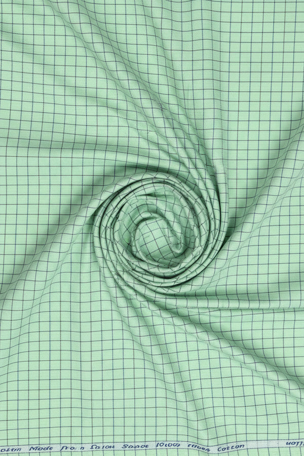 Arvind Jade Green cotton shirting fabric with check pattern, ideal for shirts and clothing projects.