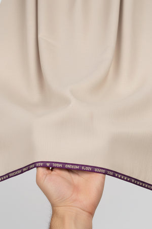 Raymond Ivory polywool trousers and suiting fabric, unstitched, luxurious material with a smooth texture and elegant appearance.