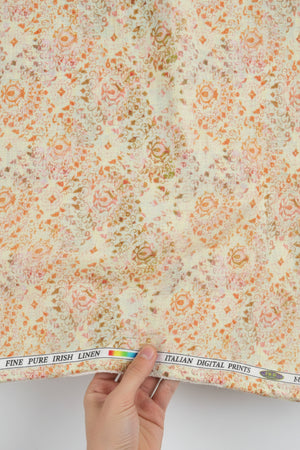 Floral patterned fabric with a visible brand label at the top.