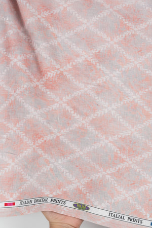 Textured surface with a ruler indicating measurements, featuring a pattern of small white and gray squares.
