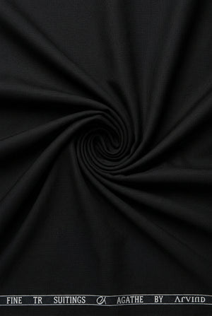 Black Arvind Terry Rayon Suiting Fabric with smooth texture, shown in a close-up image highlighting its fabric surface and weave.