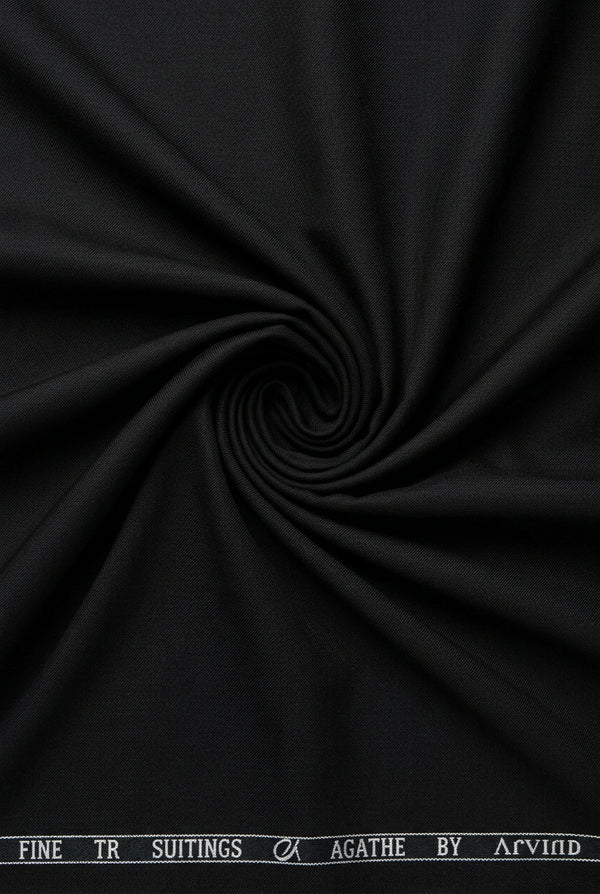 Black Arvind Terry Rayon Suiting Fabric with smooth texture, shown in a close-up image highlighting its fabric surface and weave.