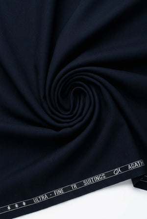 Navy blue Arvind Terry Rayon Suiting Fabric with a smooth texture, suitable for making elegant traditional or formal garments.