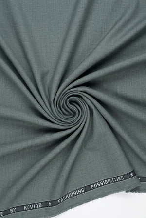 Grey Arvind Terry Rayon unstitched suit fabric, showing smooth texture and fabric details for sewing and fashion design.