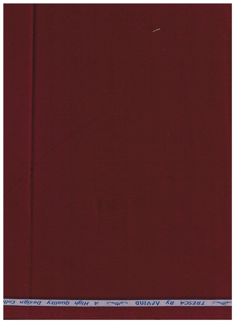 A close-up of a dark burgundy fabric surface with a narrow white tape along the top edge reading 'TRESCA By ARY1ND A High Quality Design Co.'.