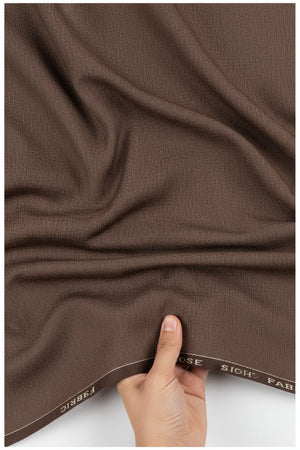 Raymond unstitched polyviscose trouser fabric in brown with a smooth, textured finish, ideal for tailored men's trousers.