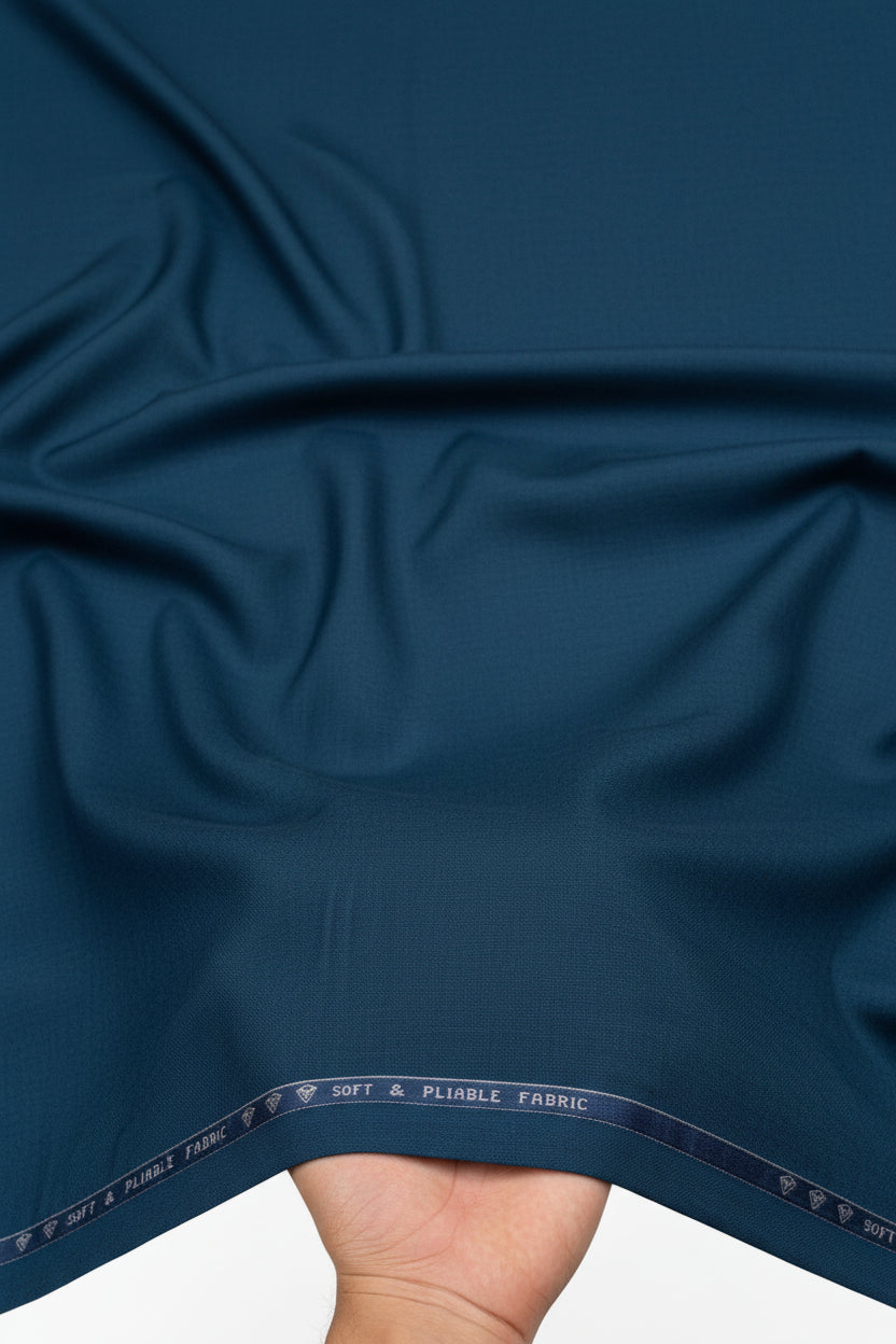 Raymond Luxurious unstitched royal blue poly-viscose trouser fabric with subtle texture and drape, ideal for custom tailoring.
