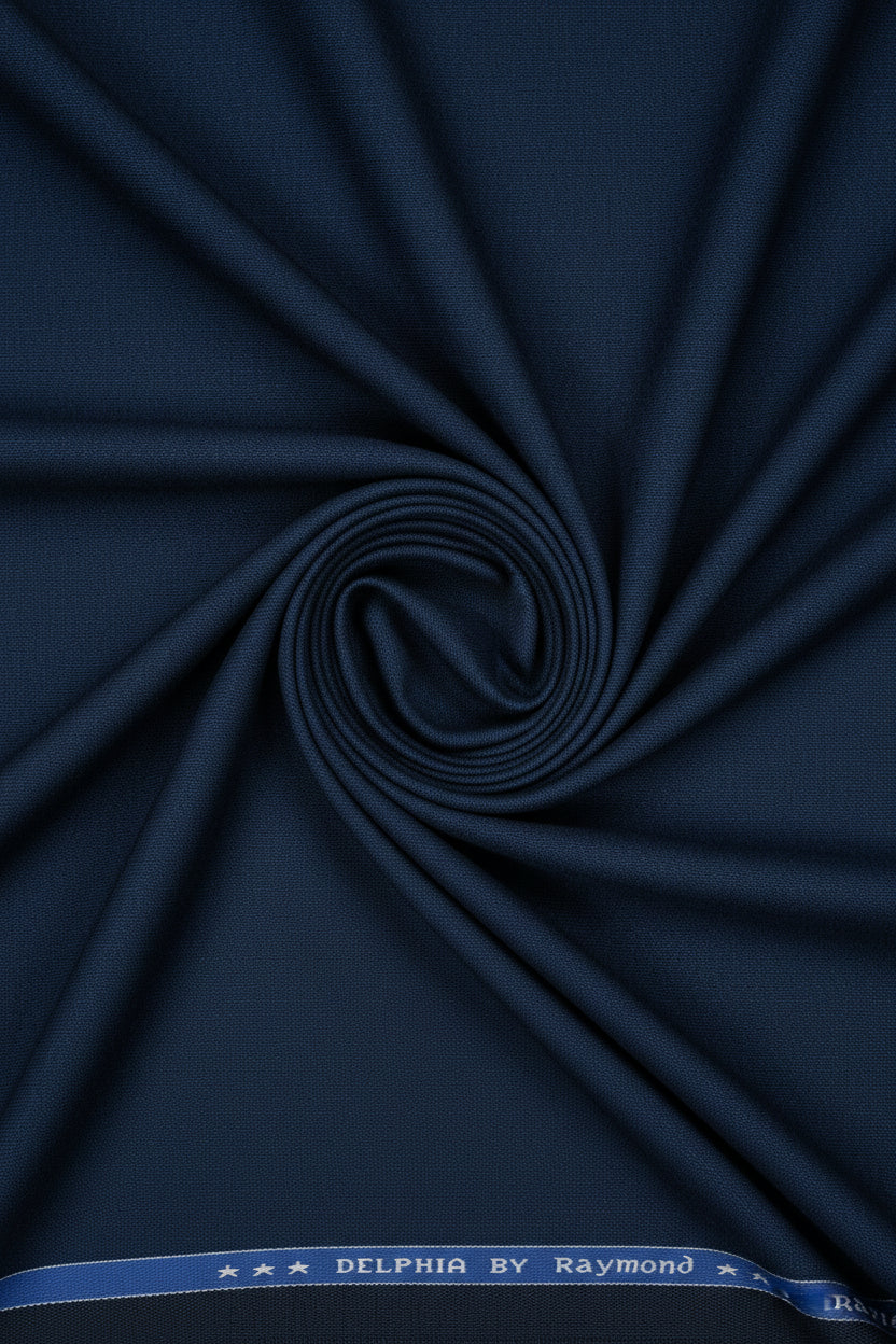 Navy blue Raymond poly viscose trousers and suiting fabric, showing the fabric texture and tailored fit.