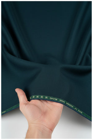 Dark slate green Raymond unstitched poly viscose trousers fabric, close-up view of soft, lightweight material for tailoring.