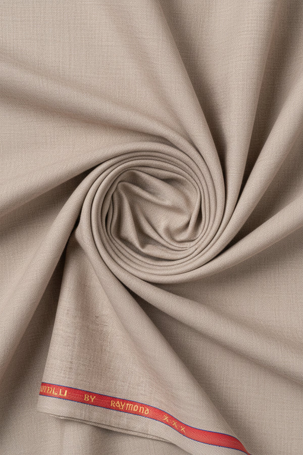 Beige Raymond poly viscose suit fabric with a smooth, lightweight viscose blend texture suitable for tailored garments.