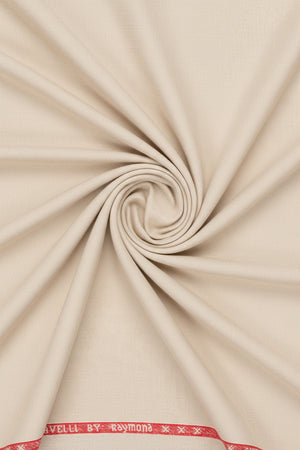 Raymond unstitched poly viscose trousers and suiting fabric in sand beige, fabric swatch with textured appearance and folded edges.