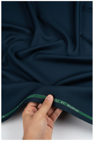 Raymond Polyviscose slate blue trousers and suiting fabric, close-up showing textured fabric and color details.
