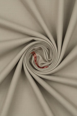 Beige Raymond unstitched poly wool trouser fabric, suitable for tailoring and sewing, with a smooth, woven texture.