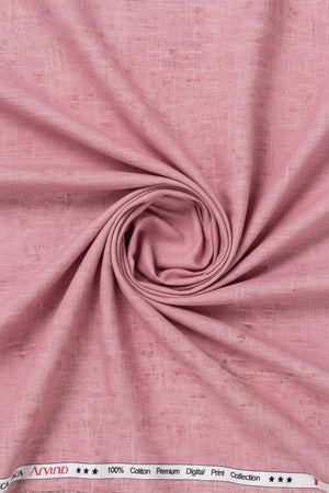 Rose pink Tresca cotton digital print shirting fabric by Arvind, showcasing a detailed pattern on soft, luxurious textile.